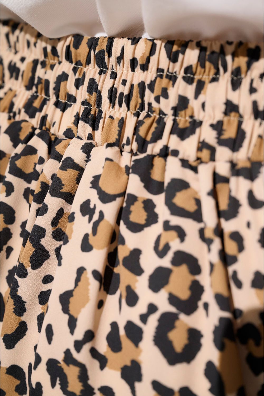 Tissu de pantalon anti-UV - Positano à motif léopard, élasticité confortable pour femme, protection solaire UPF 50+.