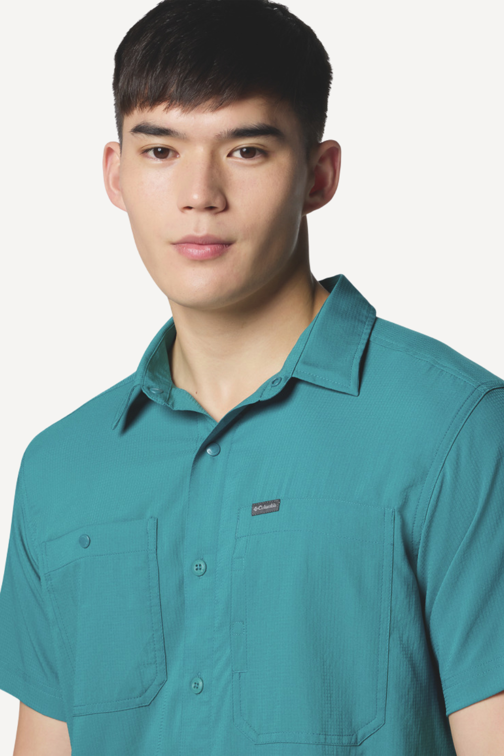 Chemise anti-UV pour homme, couleur teal, légère et respirante, certifiée UPF50+ pour protection solaire.