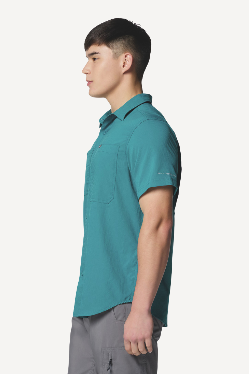 Chemise anti-UV bleu turquoise pour homme, légère et respirante, offrant une protection solaire UPF50+.