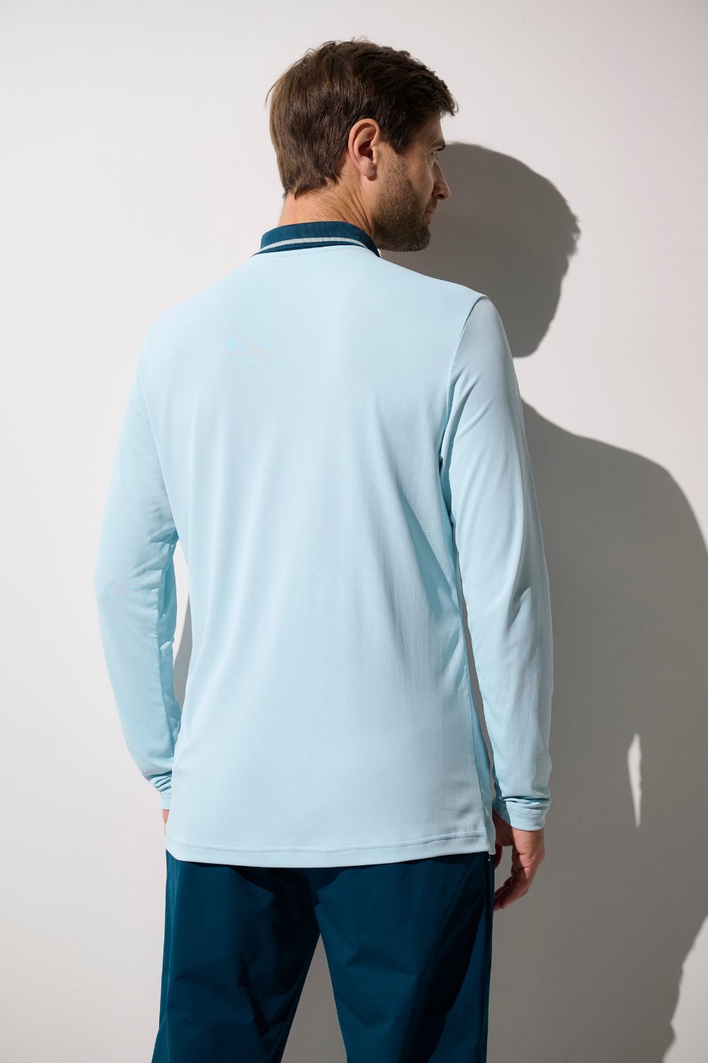 Polo anti-UV - Augusta bleu clair pour homme, léger et respirant, offrant protection solaire UPF 50+.