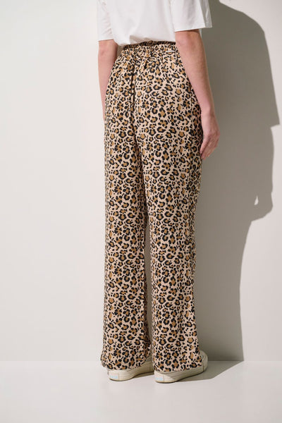 Pantalon anti-UV - Positano motifs léopard pour femme, léger et élégant, idéal pour une protection solaire.