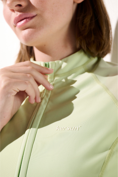 Veste de bain anti-UV Malta en vert clair pour femme, légère et à manches courtes, modèle Ker Sun.