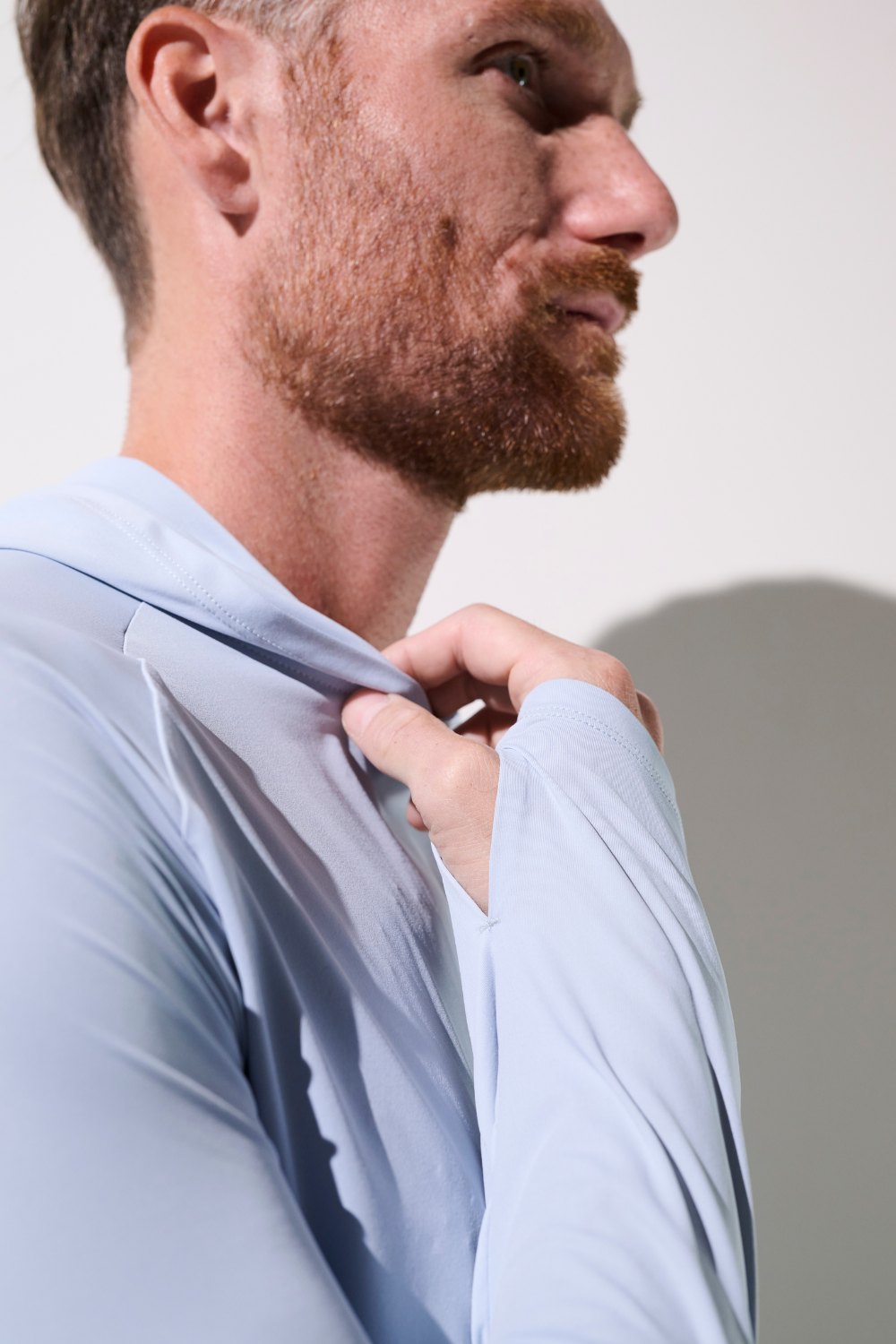 Camiseta de protección solar con capucha – Oasis