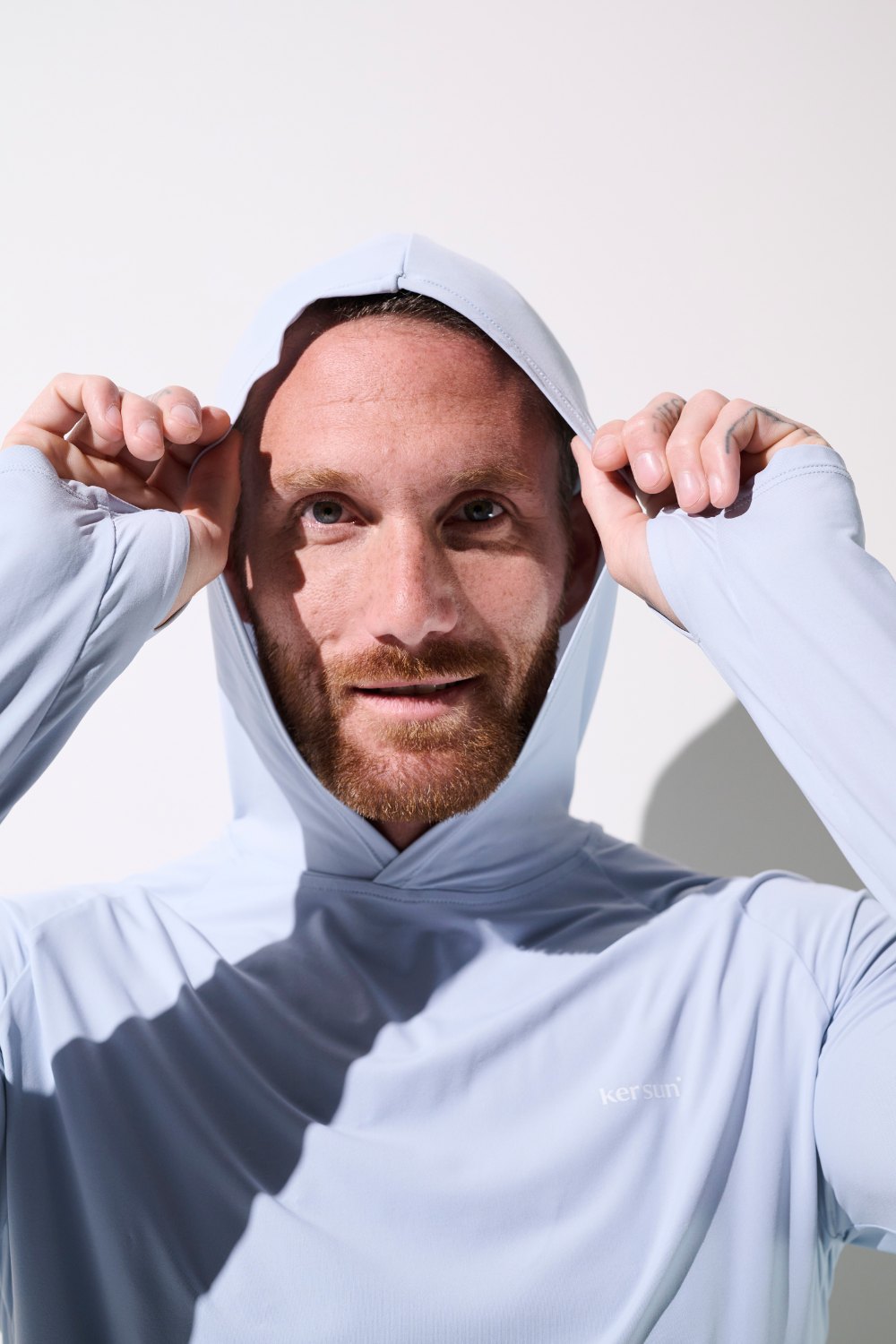 Camiseta de protección solar con capucha – Oasis