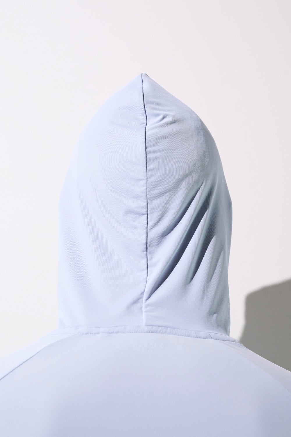 Camiseta de protección solar con capucha – Oasis