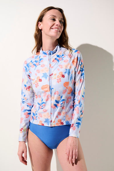 Veste de bain anti-UV - Moorea, femme en lycra floral, UPF 50+, idéale pour activités aquatiques ensoleillées.