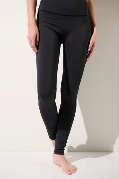 Legging de bain anti-UV - Galápagos noir, élégant et léger, pour femme, tissu UPF 50+ idéal pour les activités aquatiques.