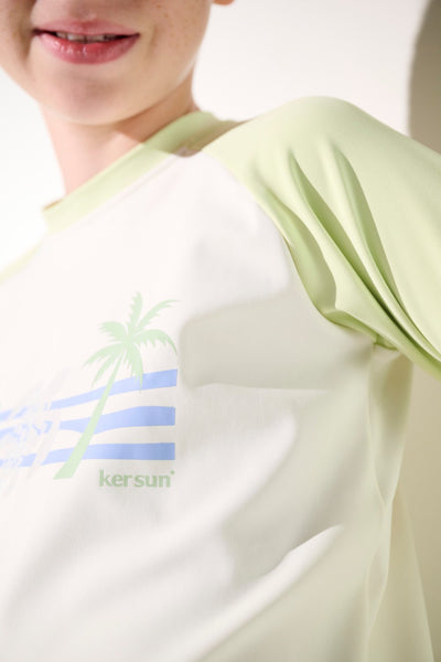 T-shirt de bain anti-UV - Fidji en vert clair, léger et respirant pour enfant, protection solaire UPF 50+.