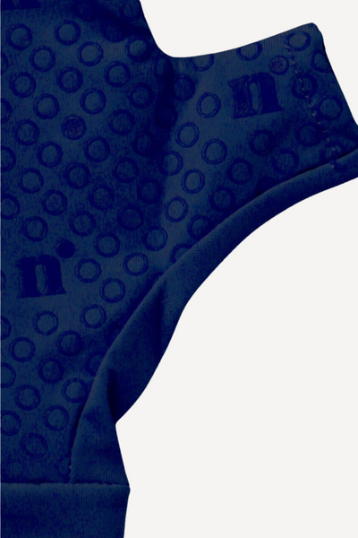 Mitaines anti-UV bleu marine avec texture à pois, offrant protection solaire UPF50+ pour activités outdoors.