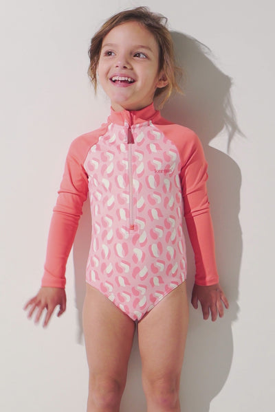 Maillot de bain anti-UV manches longues - Flores pour fille, rose, avec protection solaire UPF 50+, idéal pour les activités aquatiques.